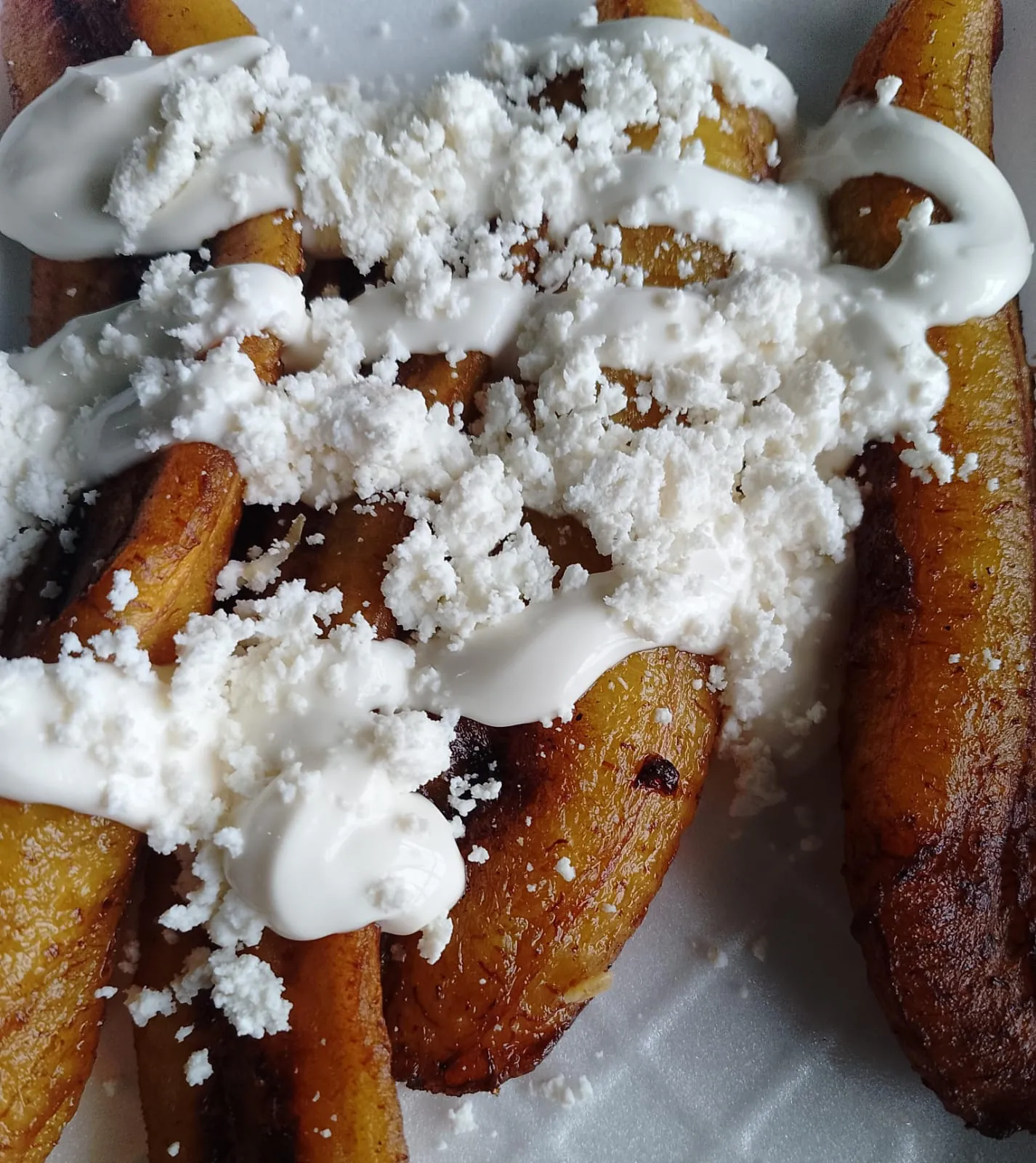 Platanitos fritos con crema y queso